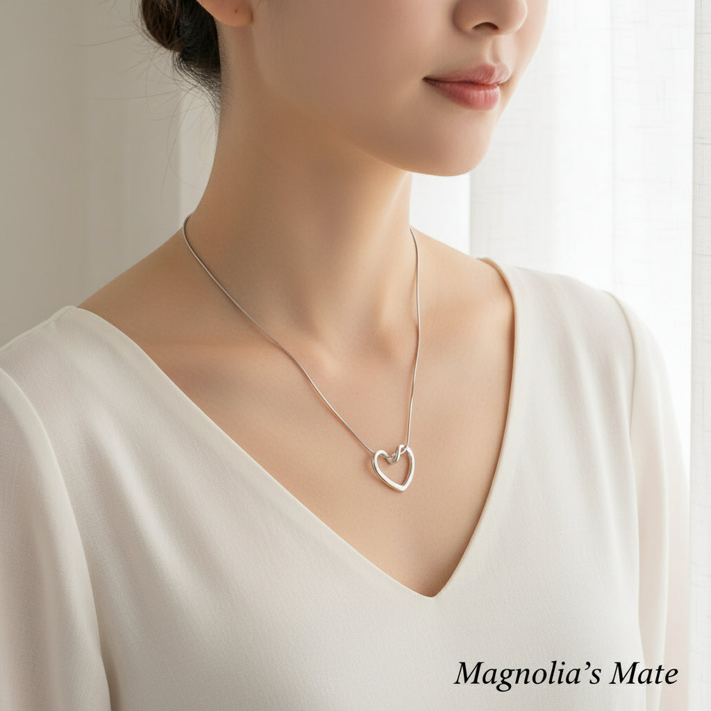 ハートツイストネックレス　ゴールド/シルバー　【スピード配送】